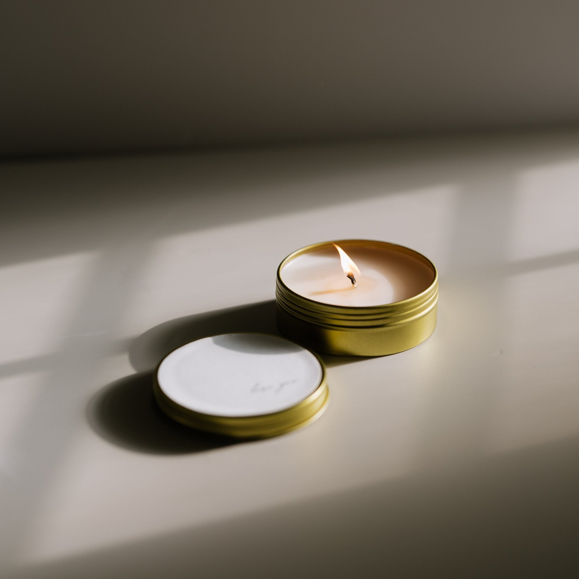 A travel-size soy candle in a stylish and reusable tin, hand-poured with clean, eco-friendly wax for on-the-go luxury. Ideal for gifting or bringing a cozy atmosphere to any space.
