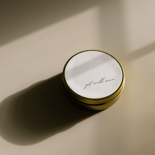 Get Well Soon. A travel-size soy candle in a stylish and reusable tin, hand-poured with clean, eco-friendly wax for on-the-go luxury. Ideal for gifting or bringing a cozy atmosphere to any space.